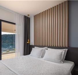 Luxury Beachfront Villa with Heated Infinity Pool near Trogir, Sleeps 8